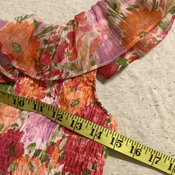 Lost in the 🔥 
NWT LC Floral Smocked Ruffle Tank - Picture 8 of 9